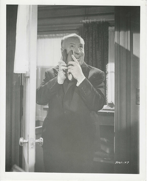 ALFRED HITCHCOCK CLOWNS AROUND ON SET OF PSYCHO (1960)