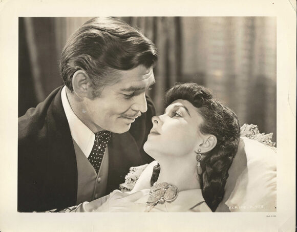 GONE WITH THE WIND -C12- CLARK GABLE AS RHETT BUTLER AND VIVIEN LEIGH AS SCARLETT O’HARA IN EARLY PUBLICITY PHOTO