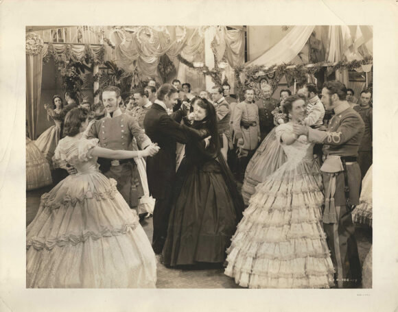 GONE WITH THE WIND 7 VIVIEN LEIGH AS SCARLETT O’HARA AND CLARK GABLE AS RHETT BUTLER AT THE BAZAAR DANCE