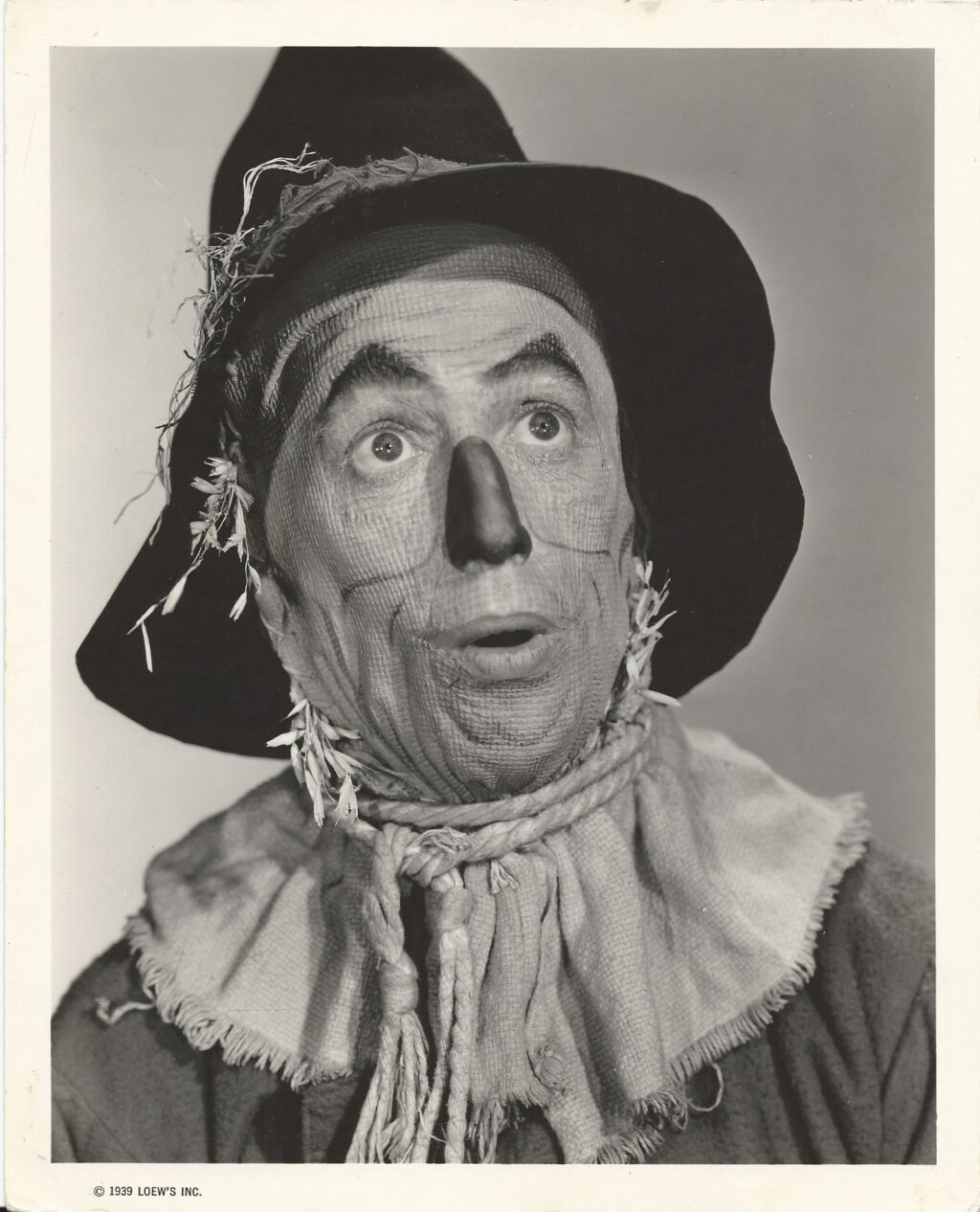 WIZARD OF OZ, THE (1939) Superb close-up of Ray Bolger as the Scarecrow