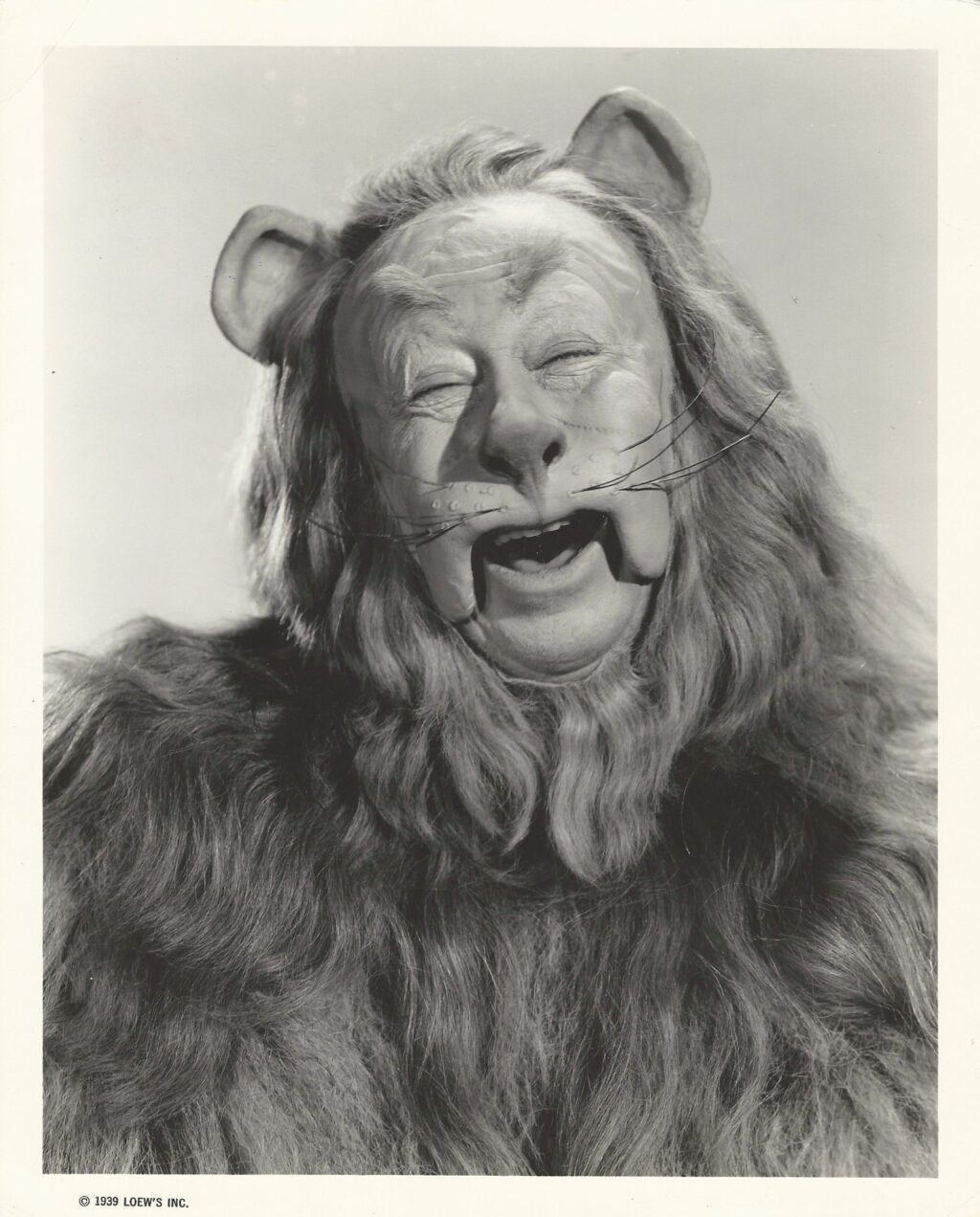 WIZARD OF OZ, THE (1939) Laughing portrait of Bert Lahr as the Cowardly Lion