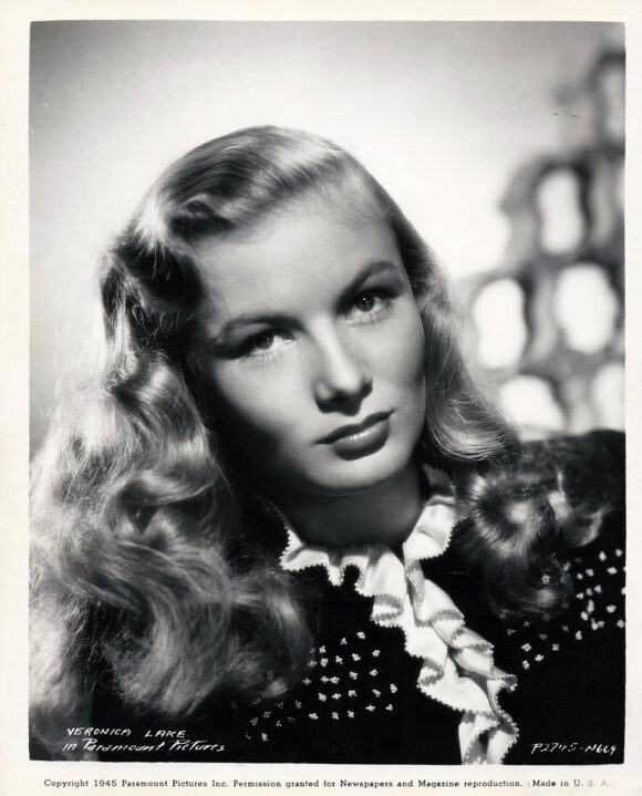 VERONICA LAKE LETS HER HAIR DOWN AT WAR'S END (1945) Photo