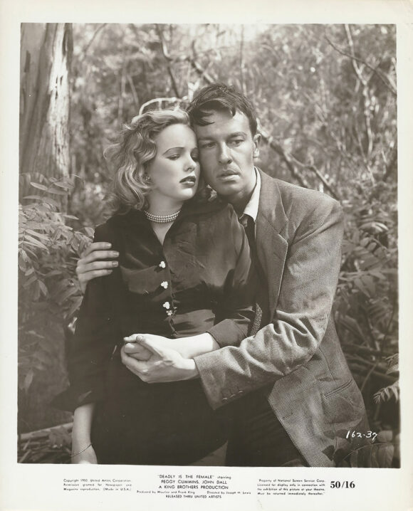 GUN CRAZY (1950) Photo of  Peggy Cummins, John Dall trapped in forest