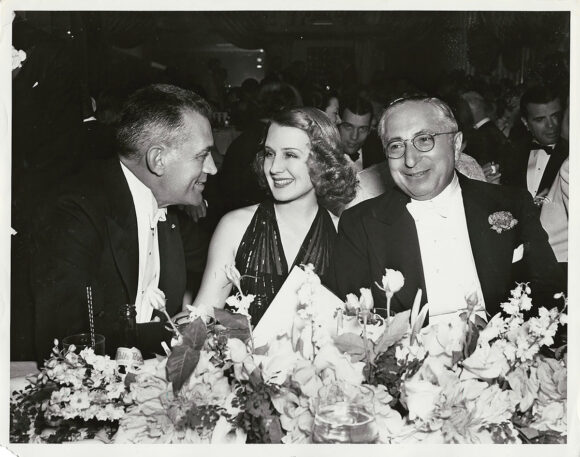 NORMA SHEARER, LOUIS B. MAYER, WOODY VAN DYKE CELEBRATE | MARIE ANTOINETTE (1938) Photo